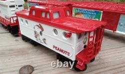 A Charlie Brown Christmas train set O gauge Lionel boxcars Snoopy engine caboose