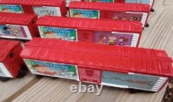 A Charlie Brown Christmas train set O gauge Lionel boxcars Snoopy engine caboose