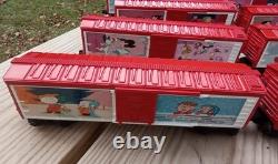 A Charlie Brown Christmas train set O gauge Lionel boxcars Snoopy engine caboose