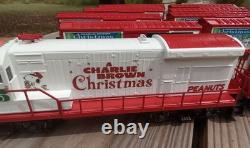 A Charlie Brown Christmas train set O gauge Lionel boxcars Snoopy engine caboose