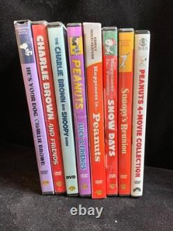 Big Lot Of Peanuts Snoopy Figurine Books Book Ends DVD Puzzles Cards Collection