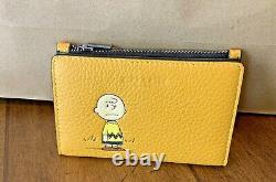 COACH X PEANUTS Slim Bifold Card Wallet With Charlie Brown C4307 Ochre Yellow