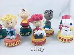 Peanuts Snoopy & Woodstock 8 figurine wall decor display case. Charlie Brown