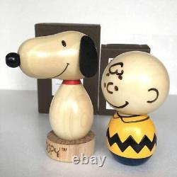 Usaburo Kokeshi Snoopy and Charlie Brown display Japanese culture