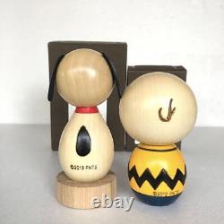 Usaburo Kokeshi Snoopy and Charlie Brown display Japanese culture