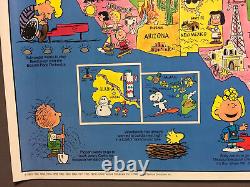 Affiche représentant la carte des États-Unis avec les représentants de Peanuts Met Life et dépliant de collection.