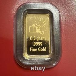 Barre d'or de 1/2 gramme Snoopy avec cadeau Peanuts 60 ans de Noël de Charlie Brown