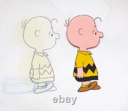 CHARLIE BROWN PEANUTS Charles SCHULZ snoopy ORIGINAL PRODUCTION CEL + DESSIN <br/>	 <br/> (Note: 'CEL' is short for celluloid, a type of transparent sheet used in animation)