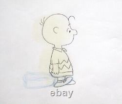 CHARLIE BROWN PEANUTS Charles SCHULZ snoopy ORIGINAL PRODUCTION CEL + DESSIN 	 <br/>

<br/> (Note: 'DESSIN' can also be translated as 'ILLUSTRATION' in this context)