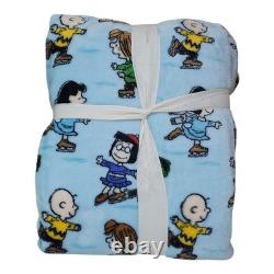 Couverture en peluche Peanuts Queen 90x90 Charlie Brown Snoopy sur patins à glace Berkshire