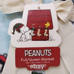 Couverture en peluche Peanuts Queen 90x90 Charlie Brown Snoopy sur patins à glace Berkshire