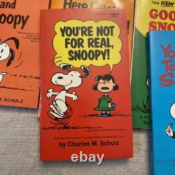 Ensemble de 23 livres de poche vintage Peanuts Charlie Brown Snoopy