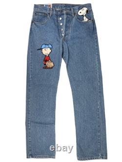 Jean en denim vintage TROP MIGNON Snoopy & Charlie Brown 28x31 Levi's Peanuts RARE