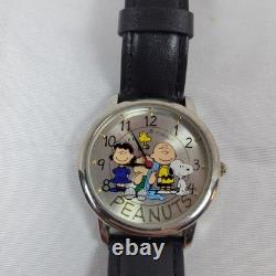 Montre Armitron Peanuts Snoopy, Lucy, Linus, Woodstock, Charlie Brown Rare en très bon état général