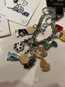 Porte-clés breloque en métal édition limitée Snoopy In Style NYC 2026 et 2 impressions